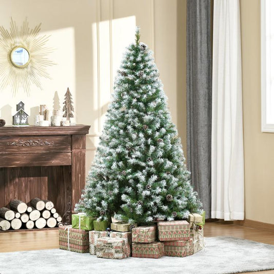 Snow-dusted artificial fir Christmas tree with pine cones on a metal stand