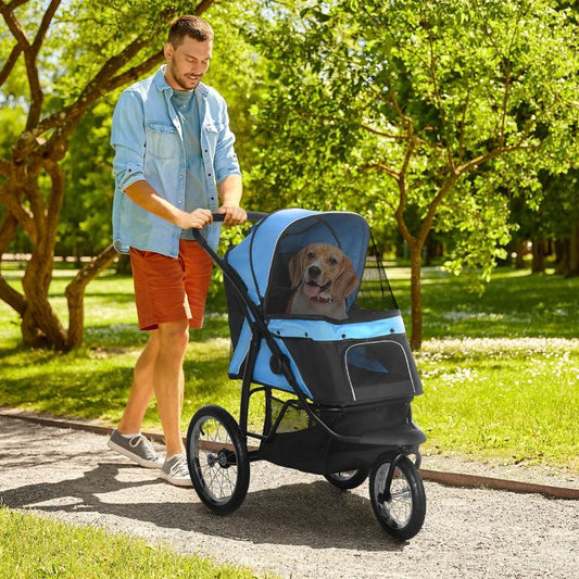Blue and black 3-wheel pet stroller with dog inside, mesh canopy, and padded base