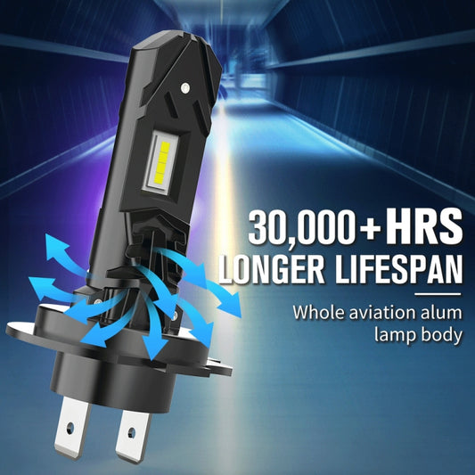 H7 LED headlight bulb with black housing, yellow LED chip, and two metal pins