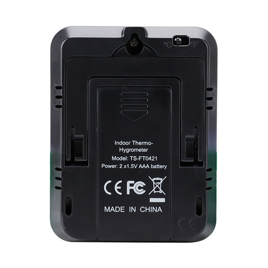 Back view of indoor temperature and humidity meter with battery compartment and mounting points