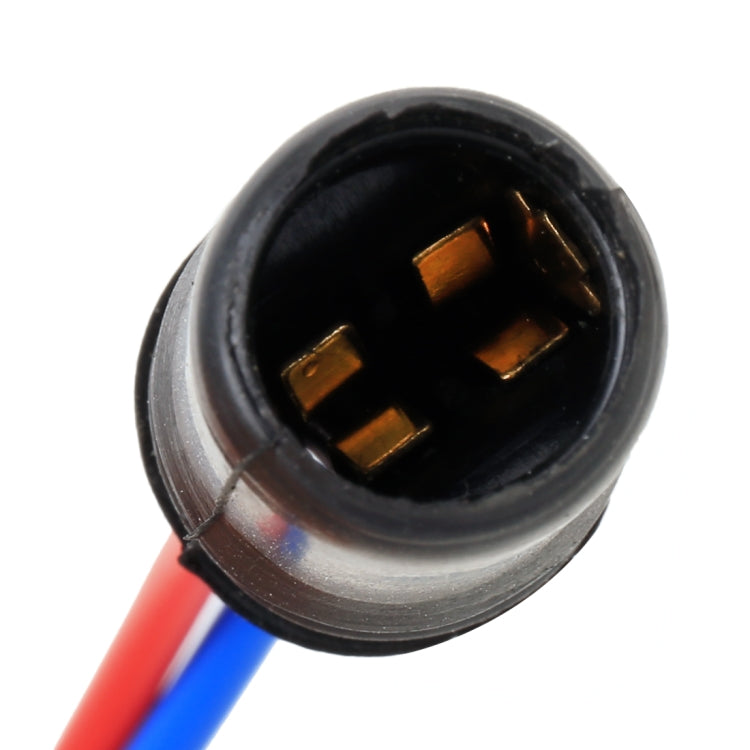 Close-up of universal LED bulb holder base socket with black housing and three gold contacts