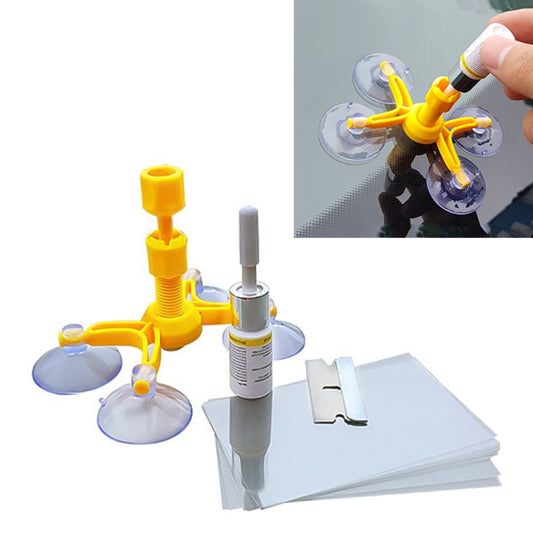 Yellow windshield repair tool kit with suction cups, resin applicator, and resin tube