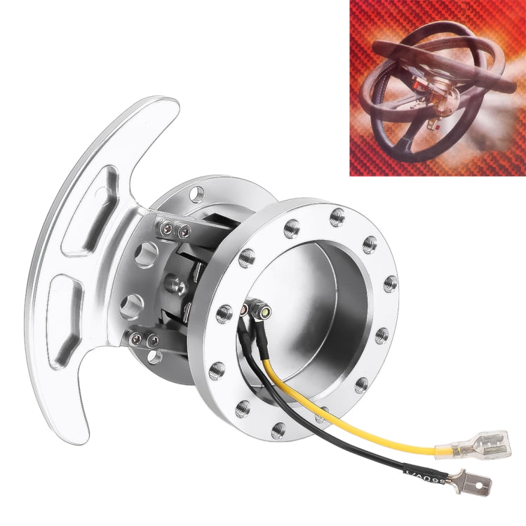 Silver steering wheel quick-release hub adapter with wiring harness and connectors
