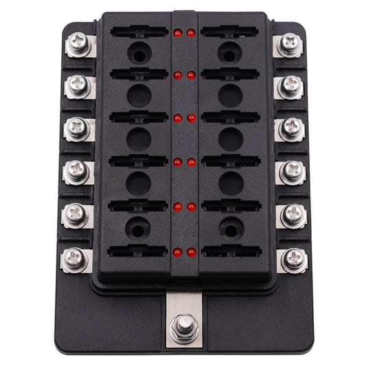 Black screw terminal fuse box base with empty fuse positions and mounting screws