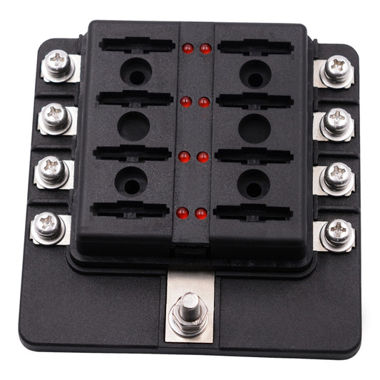 Black 1 in 8 out fuse holder with empty fuse slots, red LED dots, and metal screws