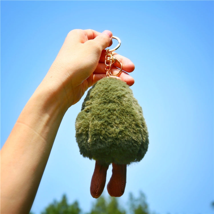 Hand holding plush avocado key ring with metal split ring and short chain