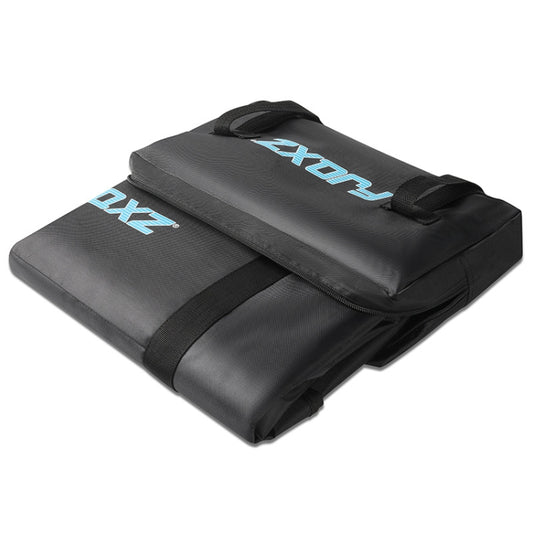 Black collapsible bike loading bag with top carry strap and fold-away design
