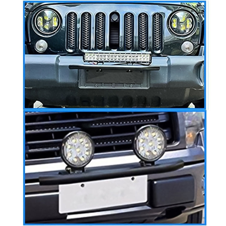 Black universal license plate bracket frame with two round lights, front-mounted on a grille