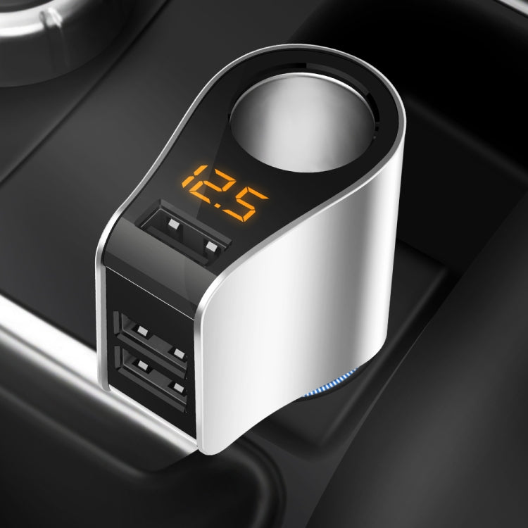 Close-up of 3-port car USB charger adapter, silver body, black face, orange LED display