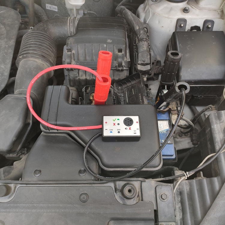Zap protector module mounted in car engine bay with red/black leads connected to terminals