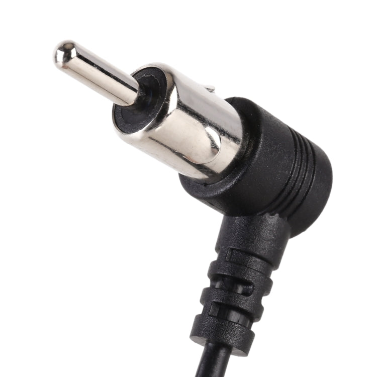 Radio antenna extension cable close-up of black connector with silver RCA plug