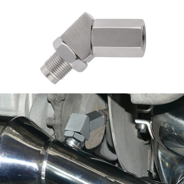 45-degree oxygen sensor adapter installed on vehicle engine near exhaust