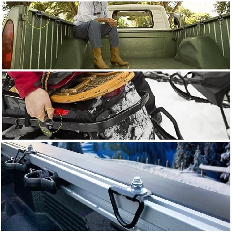 Black cargo hooks mounted on a truck bed rail and cargo setup for securing loads