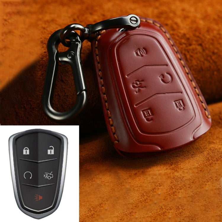 Red leather key fob cover with red stitching and metal carabiner clip