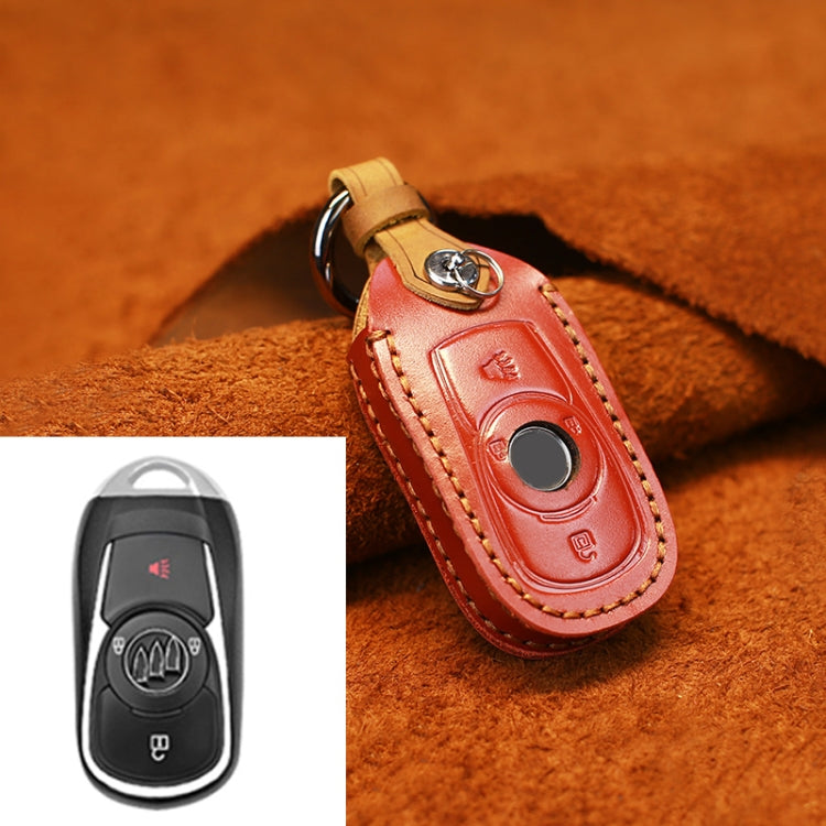 Red leather key fob protective cover with tan strap, stitching, and metal key ring
