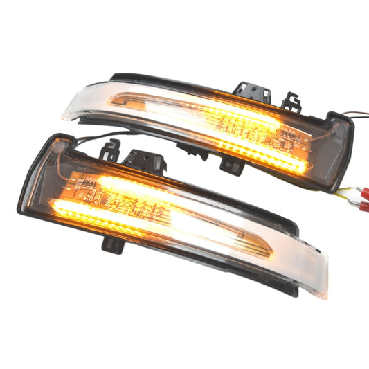 Dynamic LED mirror turn signal light set with clear lens and glowing amber strip
