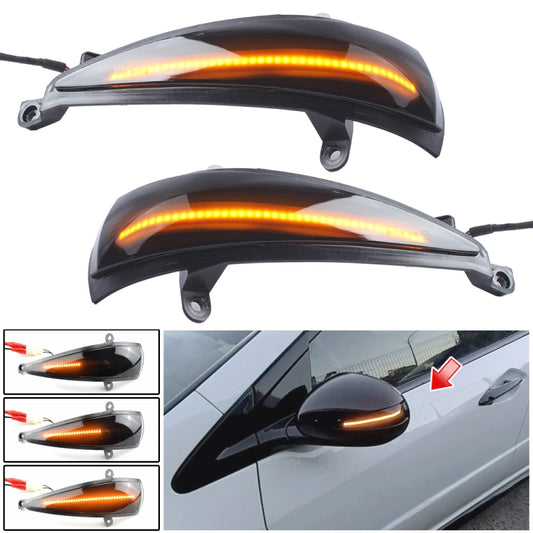 Dynamic LED mirror turn signal light pair, amber glow, black housing with mounting tabs