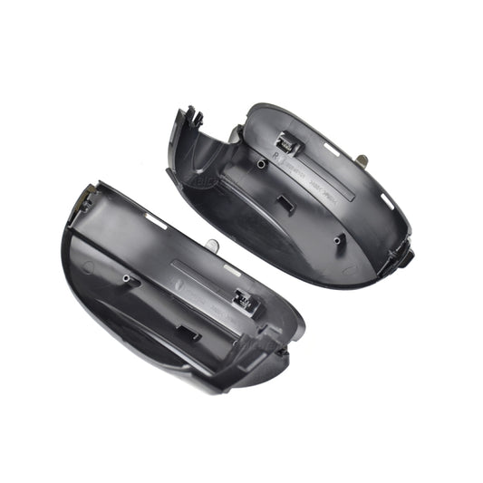 Set of dark gray mirror turn signal housings, rear view with mounting posts