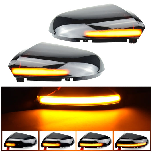 Pair of black rearview mirror LED turn signal light housings with amber strip.