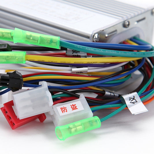 Electric vehicle controller wiring close-up with connectors and insulated wires