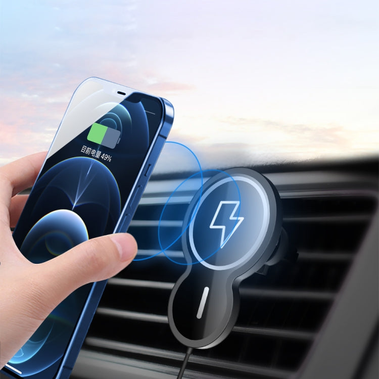 Black magnetic wireless car charger holder holding a smartphone near the air vent