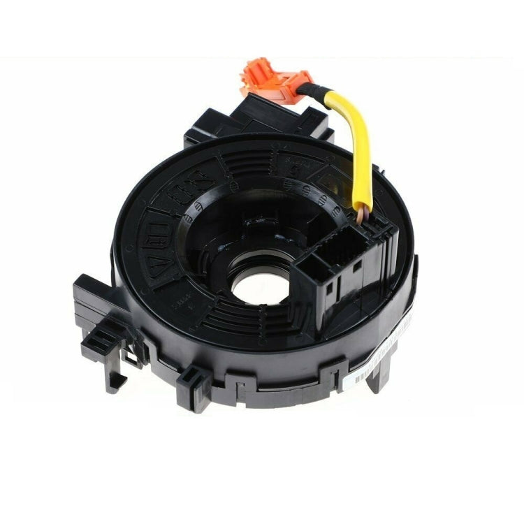 Car steering wheel spiral cable clock spring with yellow loop and black mounting tabs