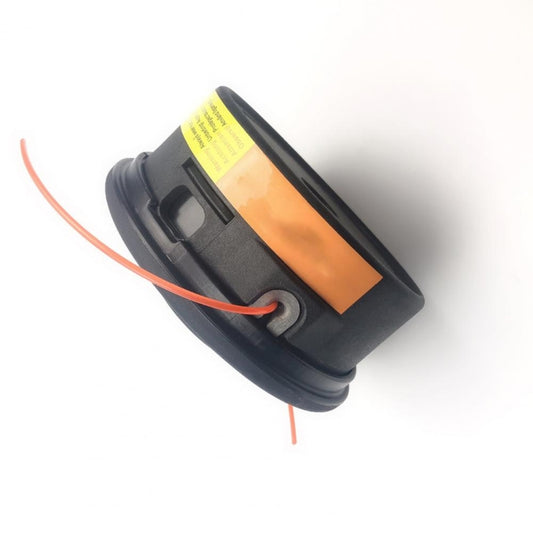 Black plastic trimmer head with orange feed line and mounting slot