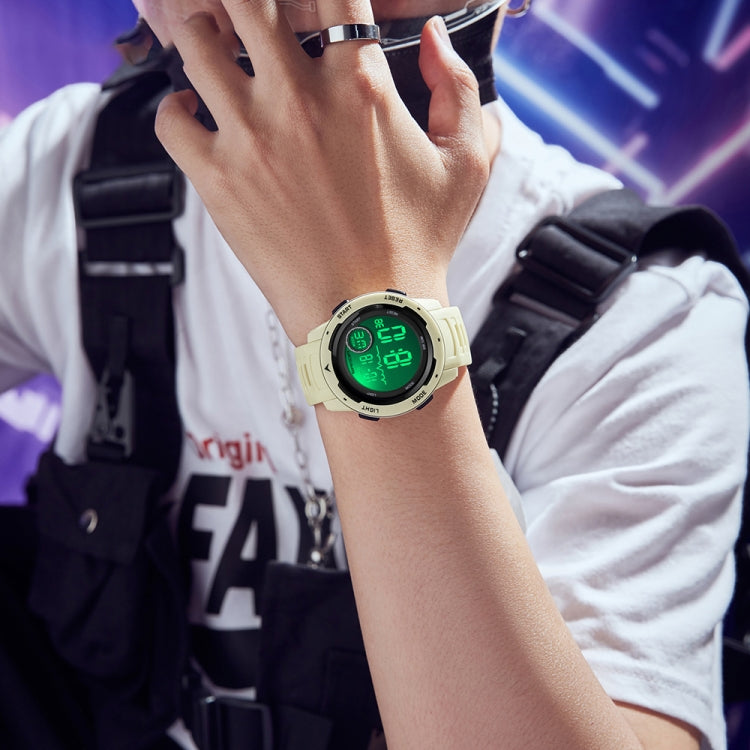 Cream dual-display digital waterproof watch on wrist with green illuminated screen
