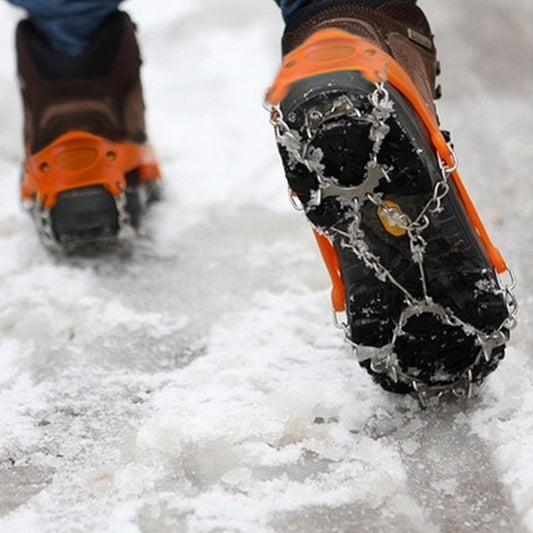 Orange ice gripper chain shoe cover with 19-tooth spikes for snow traction