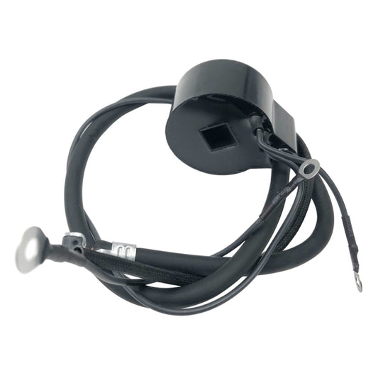 Ignition coil with dark cylindrical housing, black cables and metal grounding lead