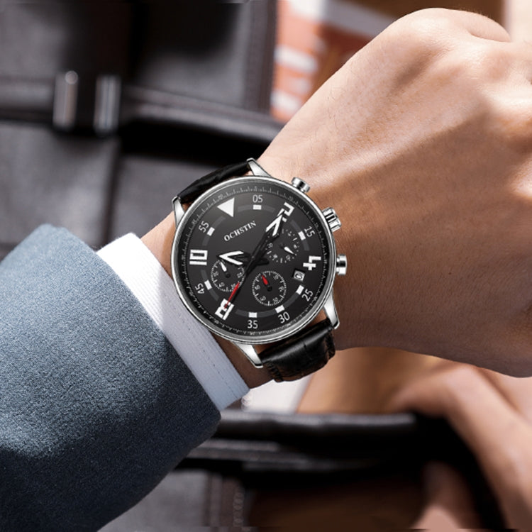 Men's quartz leather watch on wrist, black dial and black leather strap, round case