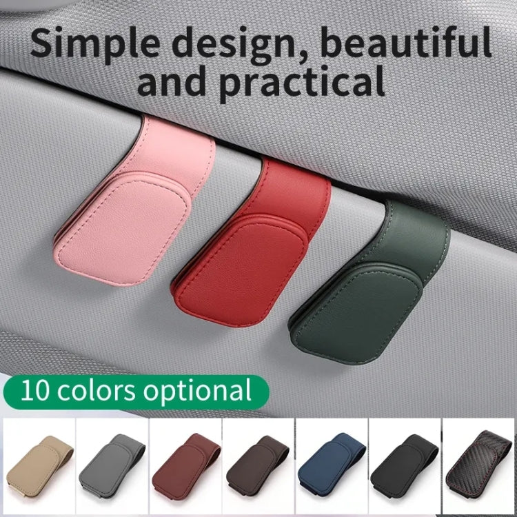 Car visor glasses holder in multiple colors shown on car dashboard fabric