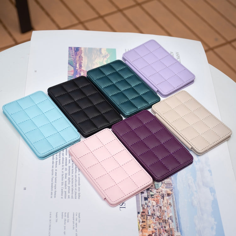 Grid-pattern mobile phone card holder stickers in multiple colors, flat lay