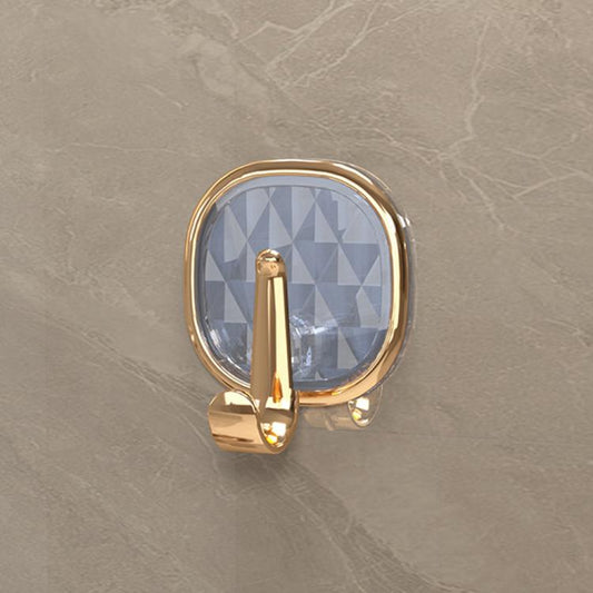 Translucent blue adhesive wall hook with gold-tone metal single hook