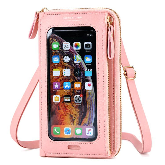 Pink zip crossbody phone bag with clear touch window and detachable shoulder strap.
