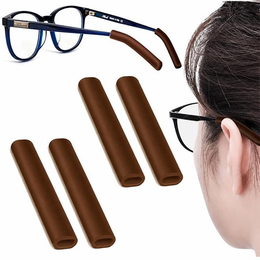 Soft silicone eyeglass ear pads, brown pair shown with eyeglass temple and wearer.