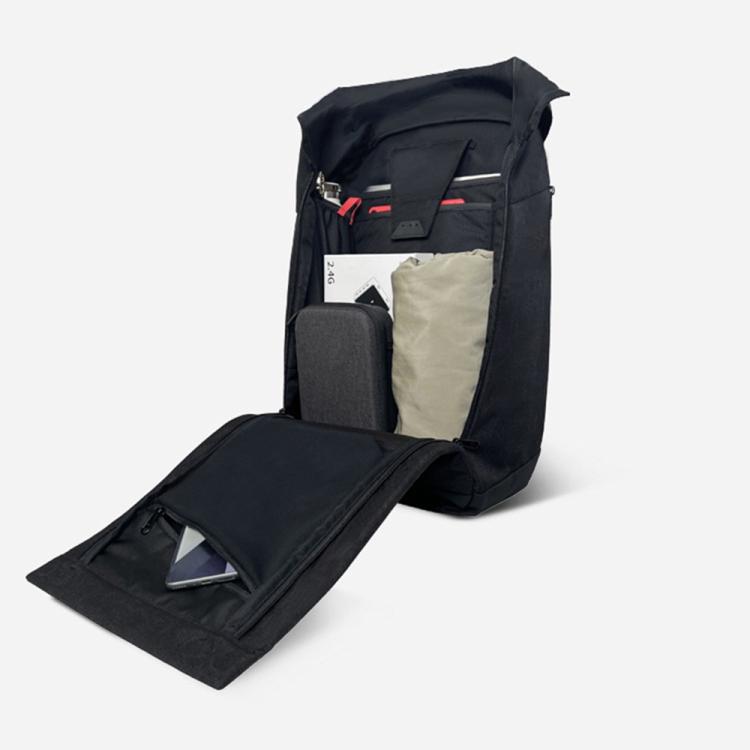 Open black backpack showing inner organizer pockets and document sleeve