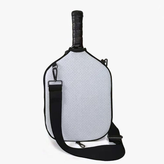 Light gray neoprene paddle bag with black shoulder strap and gold-tone hardware.