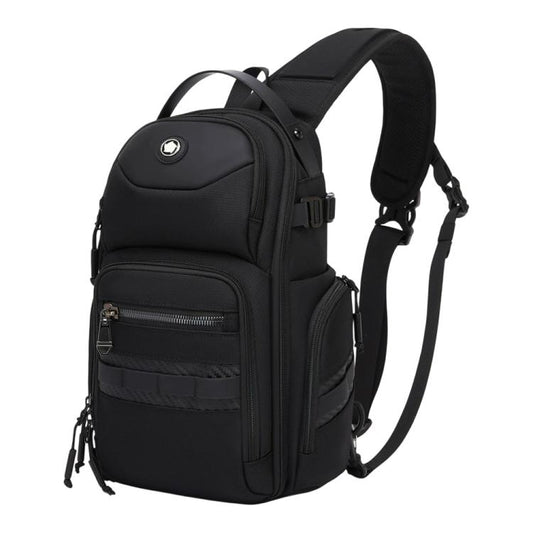 Black crossbody chest bag with top handle, adjustable strap, and front zip pockets.