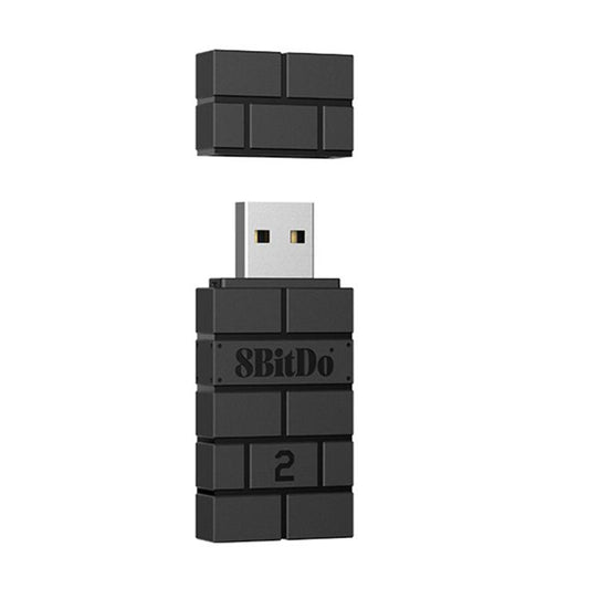 Black 8BitDo USB wireless Bluetooth receiver with stacked block body and USB plug.
