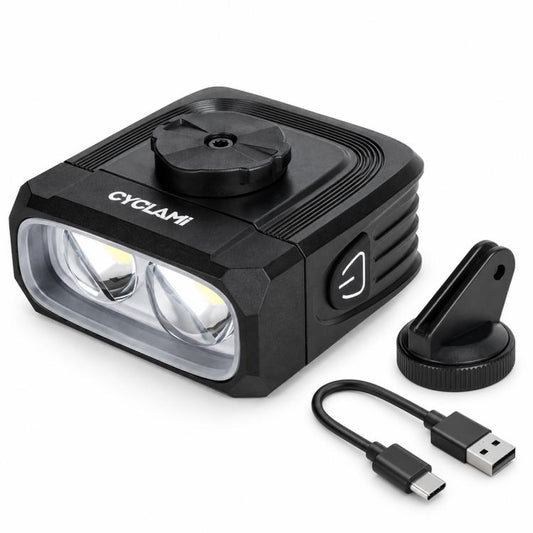 Front bike headlight with cutoff beam lens, mount bracket, and USB charging cable