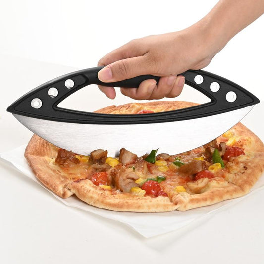 Black semi-circular pizza cutter with ring handle and stainless blade, slicing pizza