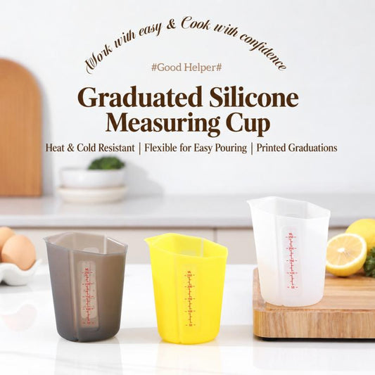 Graduated silicone measuring cup with red ml markings and flexible collapsible design