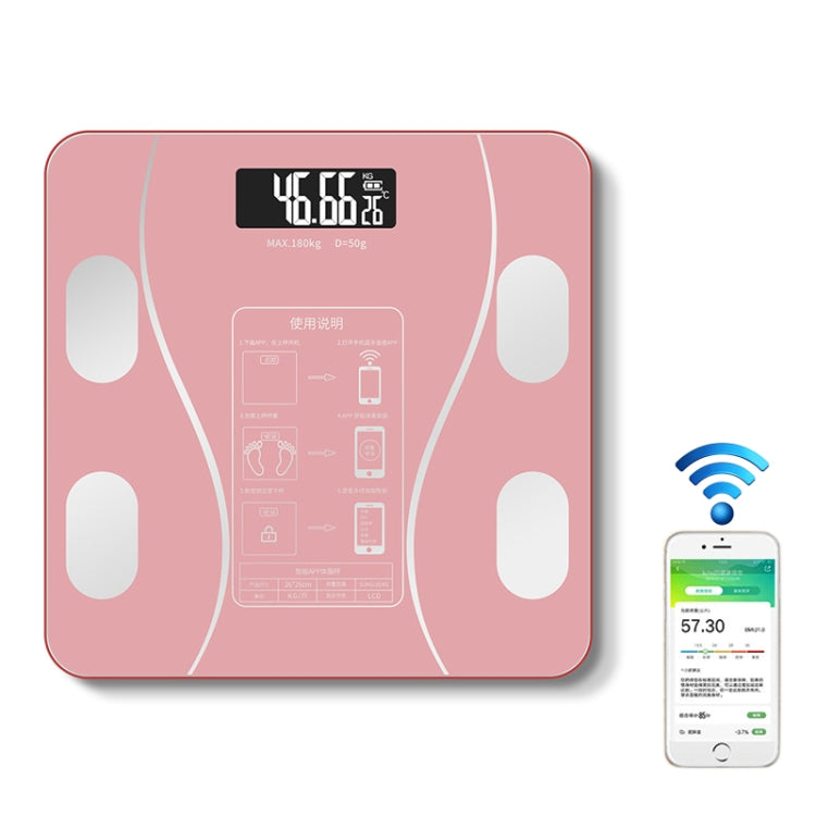 Pink smart body fat weighing scale with digital display and four sensor pads