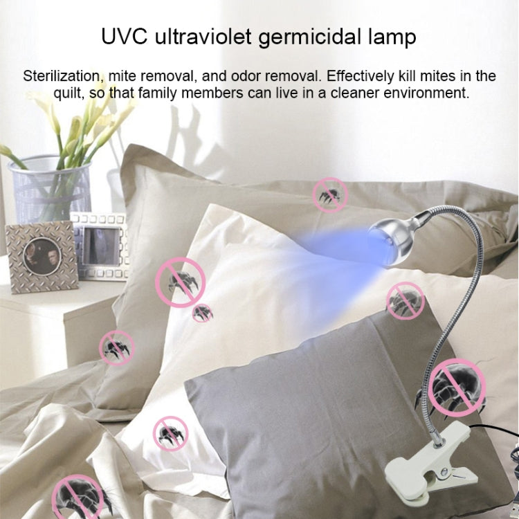 UVC clip lamp with glowing UV bulb mounted on clamp base for sterilizing use