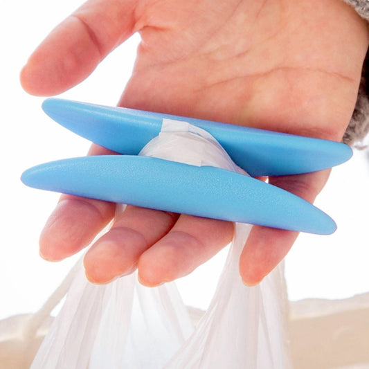 Light blue plastic I-shaped bag holder with lifting handle, in hand