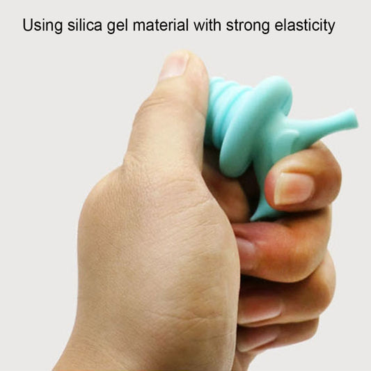 Light blue bird-shaped silicone bottle stopper held in hand