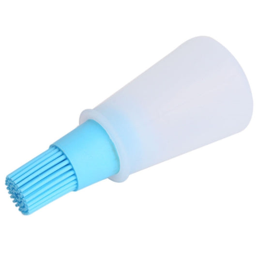 Silicone bristle oil brush tip with blue and white squeeze bottle