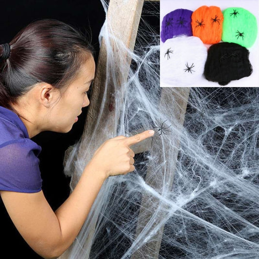 Halloween spider web yarn prop with white webbing and small black spiders