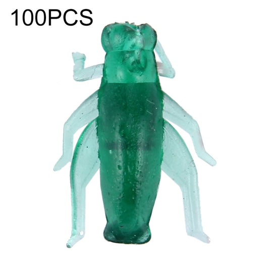 Green translucent cricket-shaped artificial fishing lure, upright view